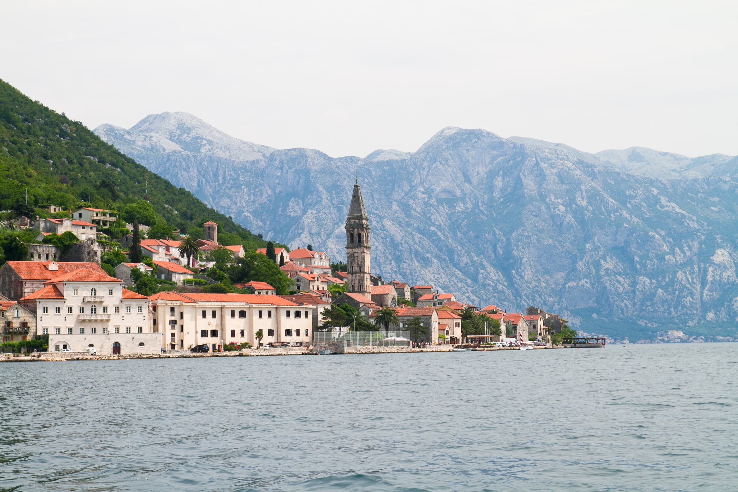 Perast seen across the Bay of Kotor, one of the hop-on hop-off bus route's stops